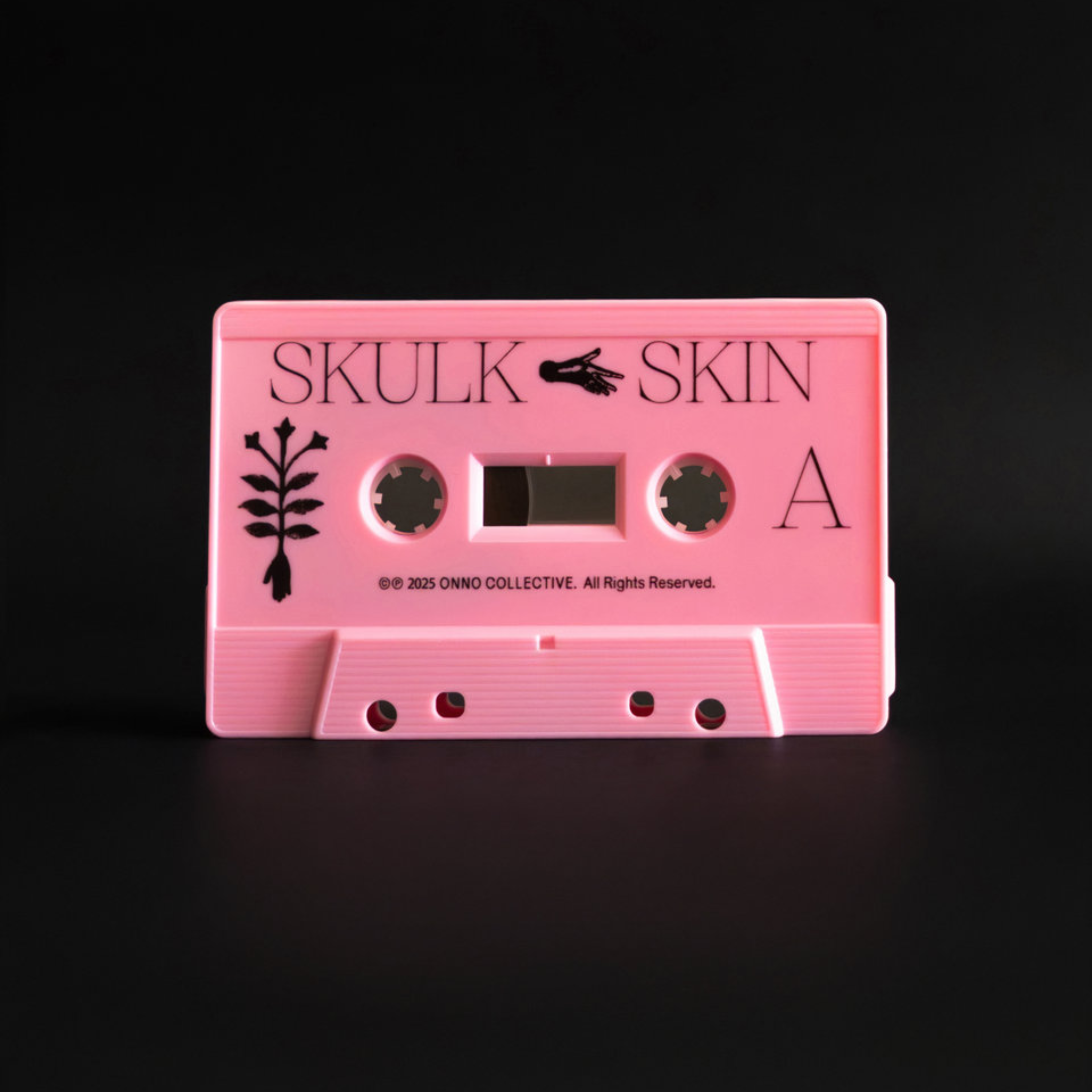 Skulk - Skin (Pink Cassette)